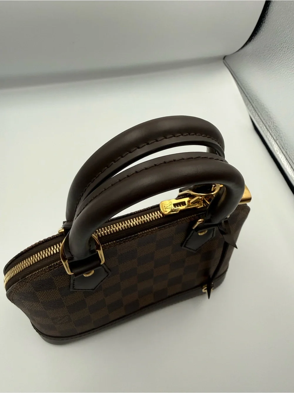 Louis Vuitton Brown Damier Ebene Alma BB with Gold Hardware